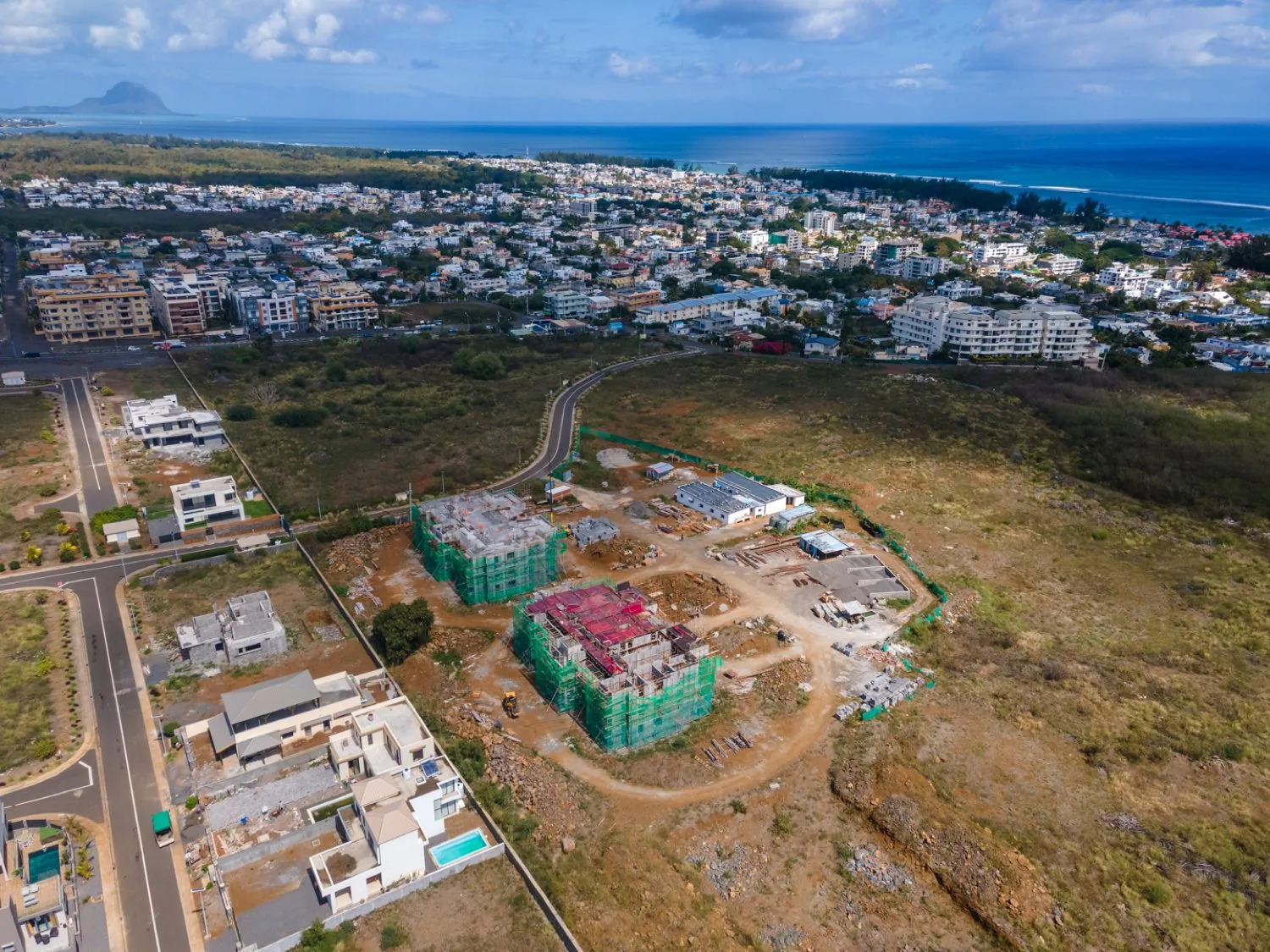 High aerial view of the Anna City site with Flic en Flac, the lagoon and the reef stretching along the horizon